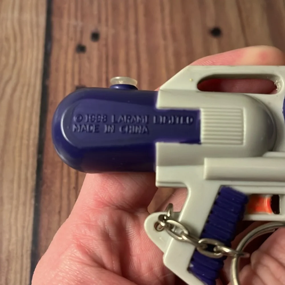 Vintage Soaker Water KeyChain 1998